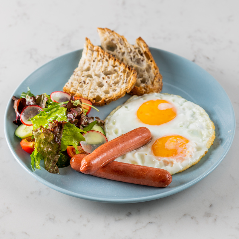 Sunny-side-up eggs with sausages